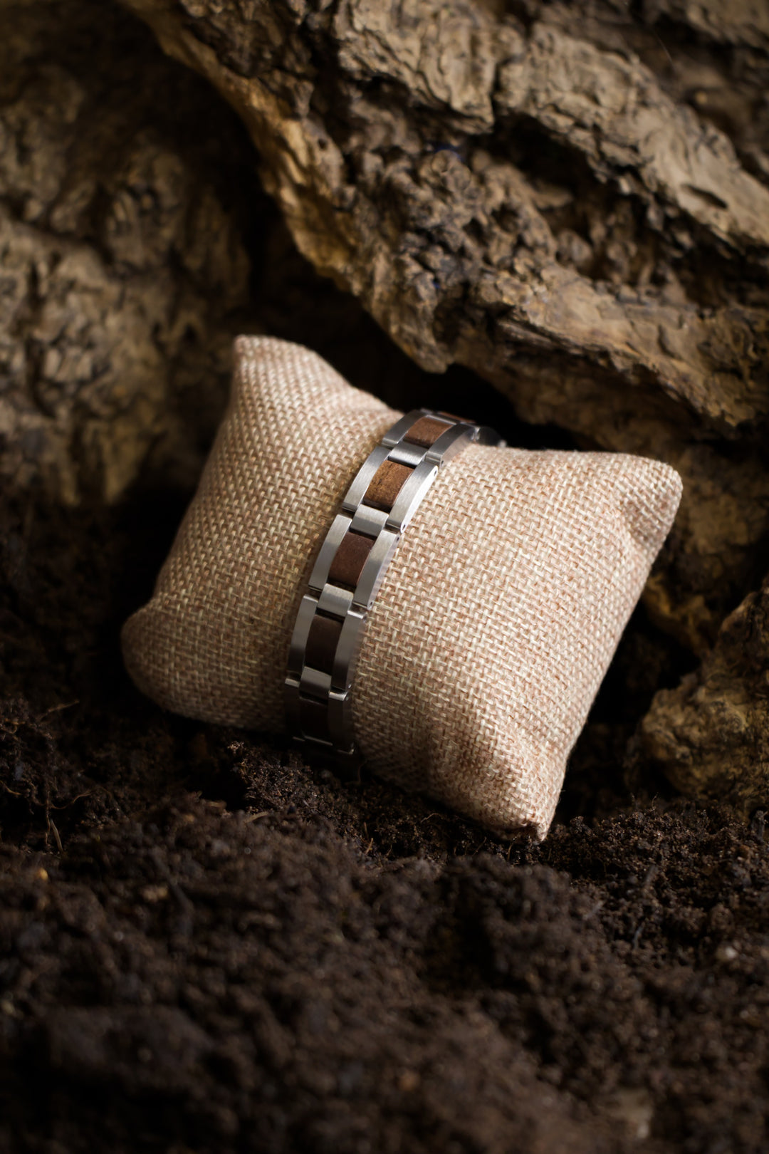 Algarve walnut and brushed steel bracelet on a hessian cushion - The Wood Look