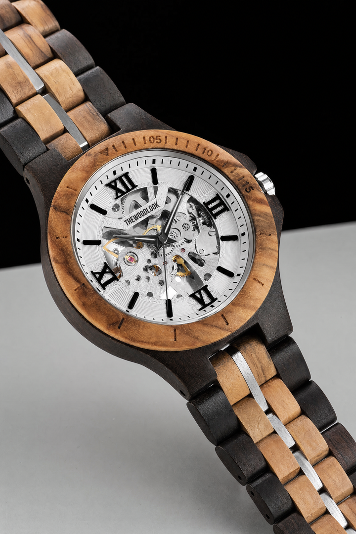 Barcelona white skeleton dial mechanical watch in ebony and olive wood, angled view - The Wood Look