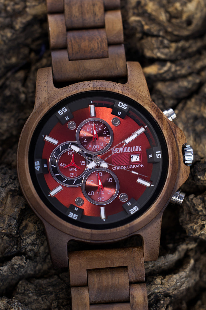 Close-up of the Edinburgh walnut chronograph watch showing the red dial and sub-dials - The Wood Look