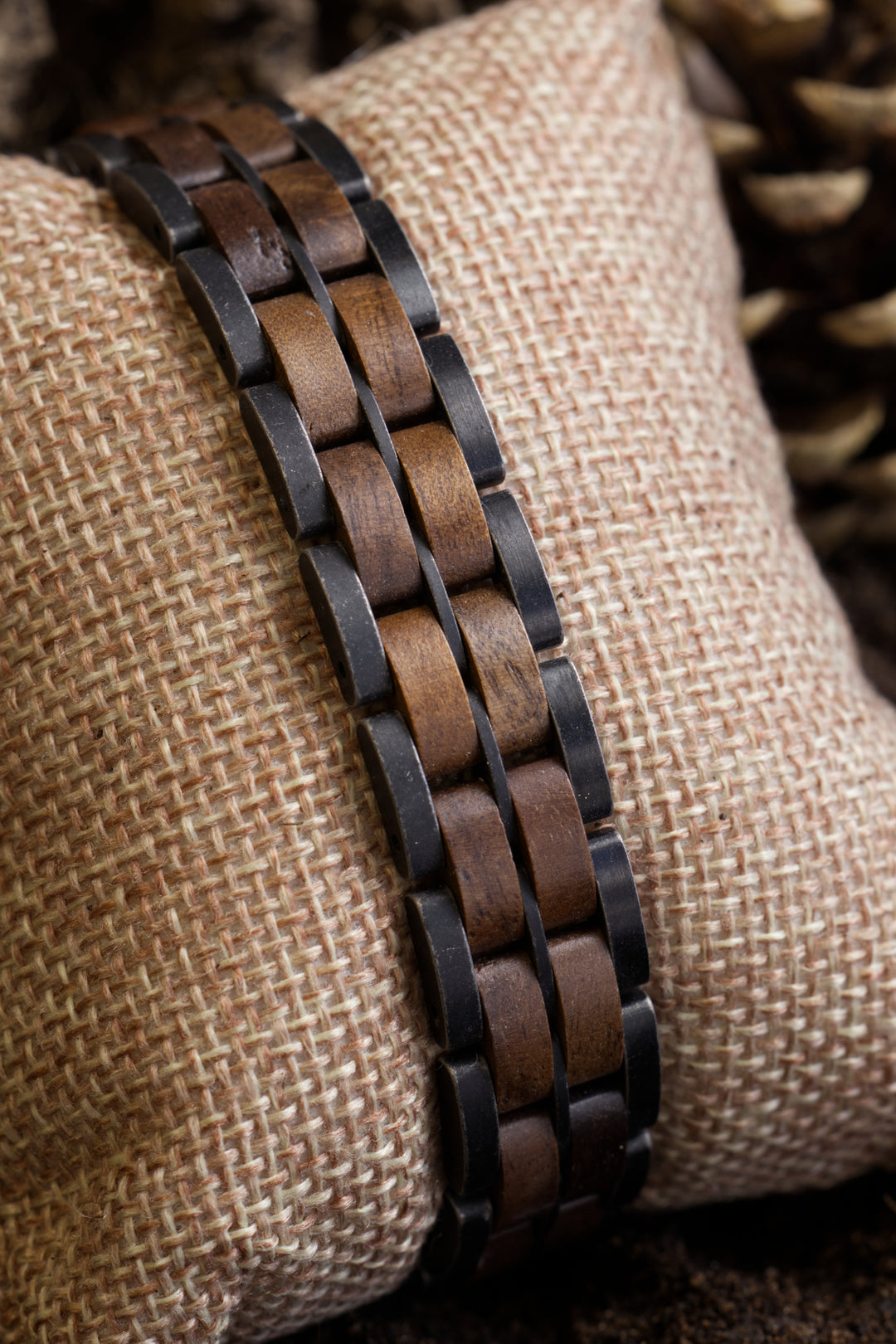 Close-up of the Kyoto bracelet in walnut and antique stainless steel - The Wood Look