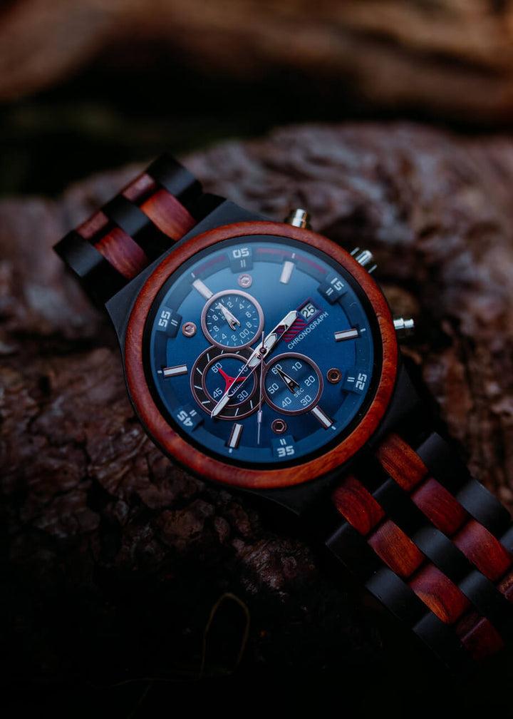 Close-up of the Lisbon chronograph wooden watch with a blue dial and red sandalwood bezel - The Wood Look