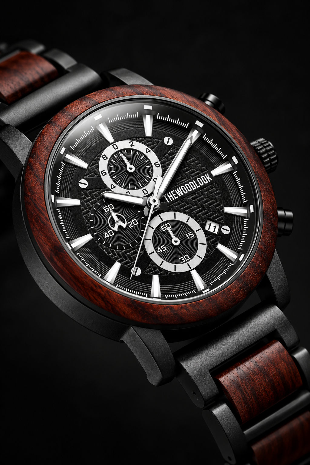 Close-up of the London red sandalwood bezel and black chronograph dial