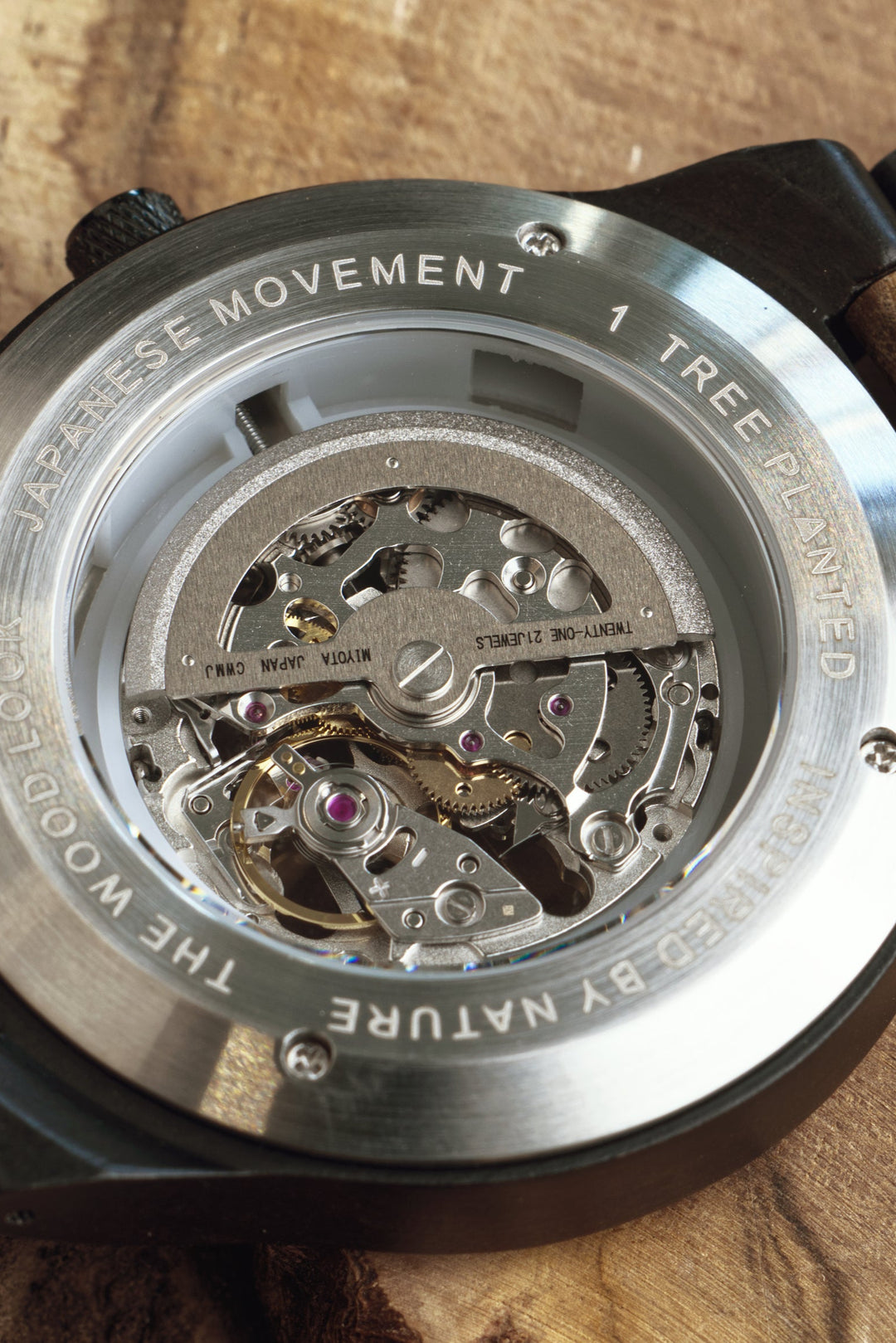 See-through steel caseback of a mechanical wooden watch showing the Japanese automatic movement - The Wood Look