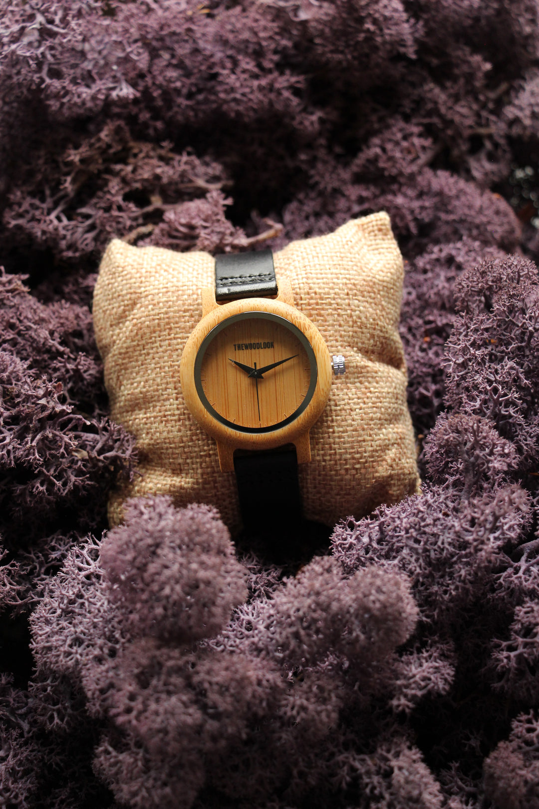Sydney bamboo dial wooden watch with a black strap, angled view - The Wood Look