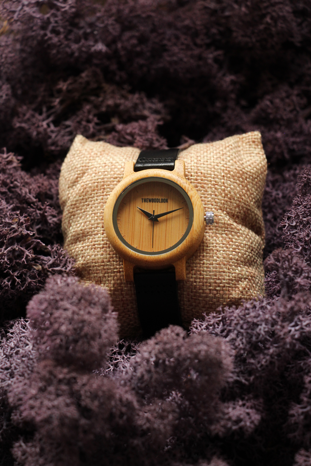 Sydney minimalist bamboo watch on a hessian cushion with purple moss - The Wood Look