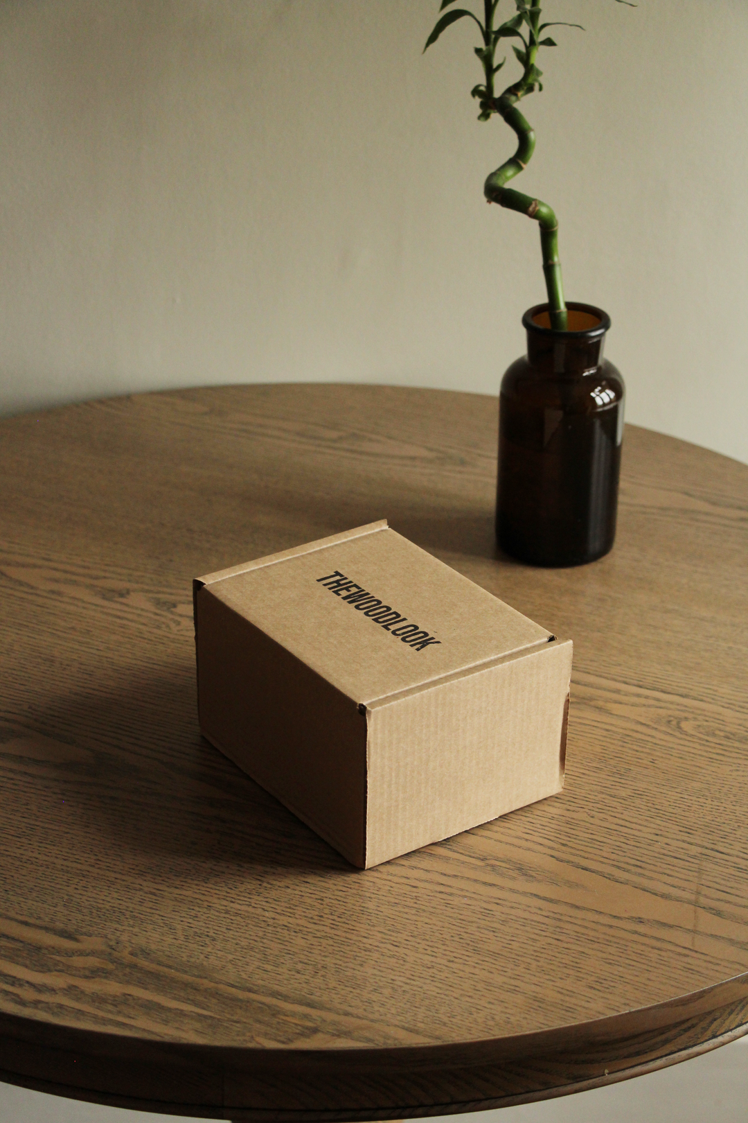 The Wood Look branded gift box on a wooden table - The Wood Look