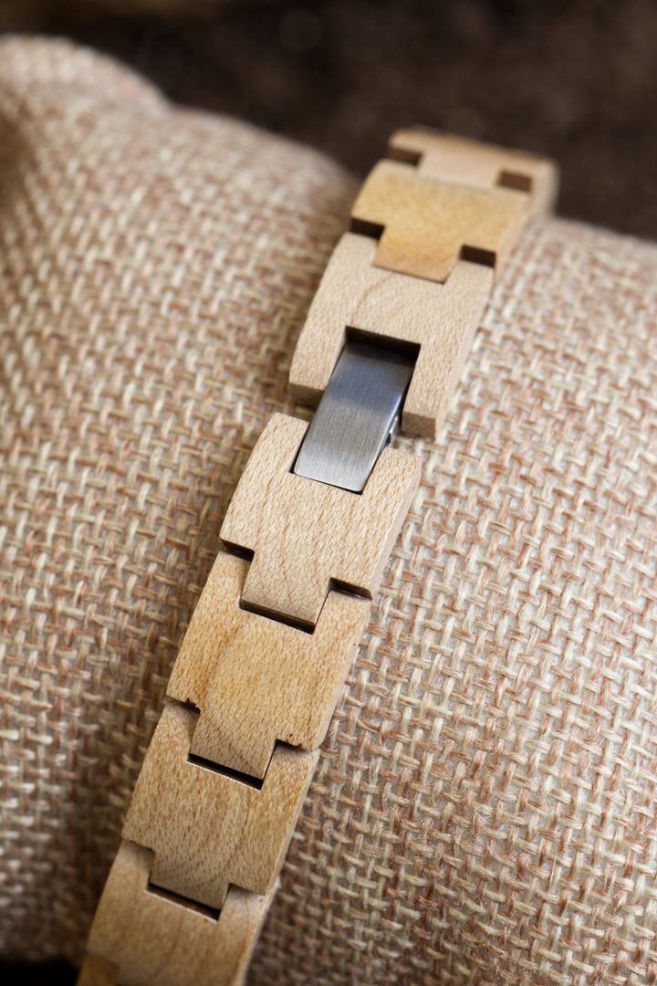 Vancouver maple wooden bracelet links and clasp on a cushion - The Wood Look