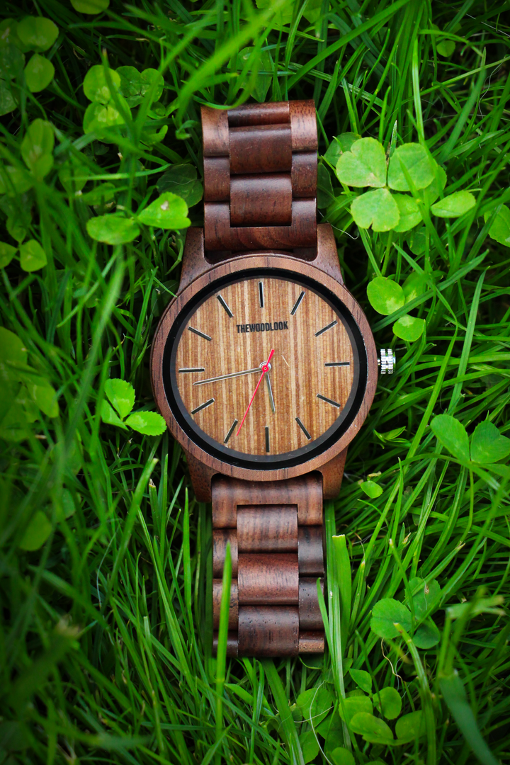 Warsaw minimalist walnut wooden watch from above on grass - The Wood Look