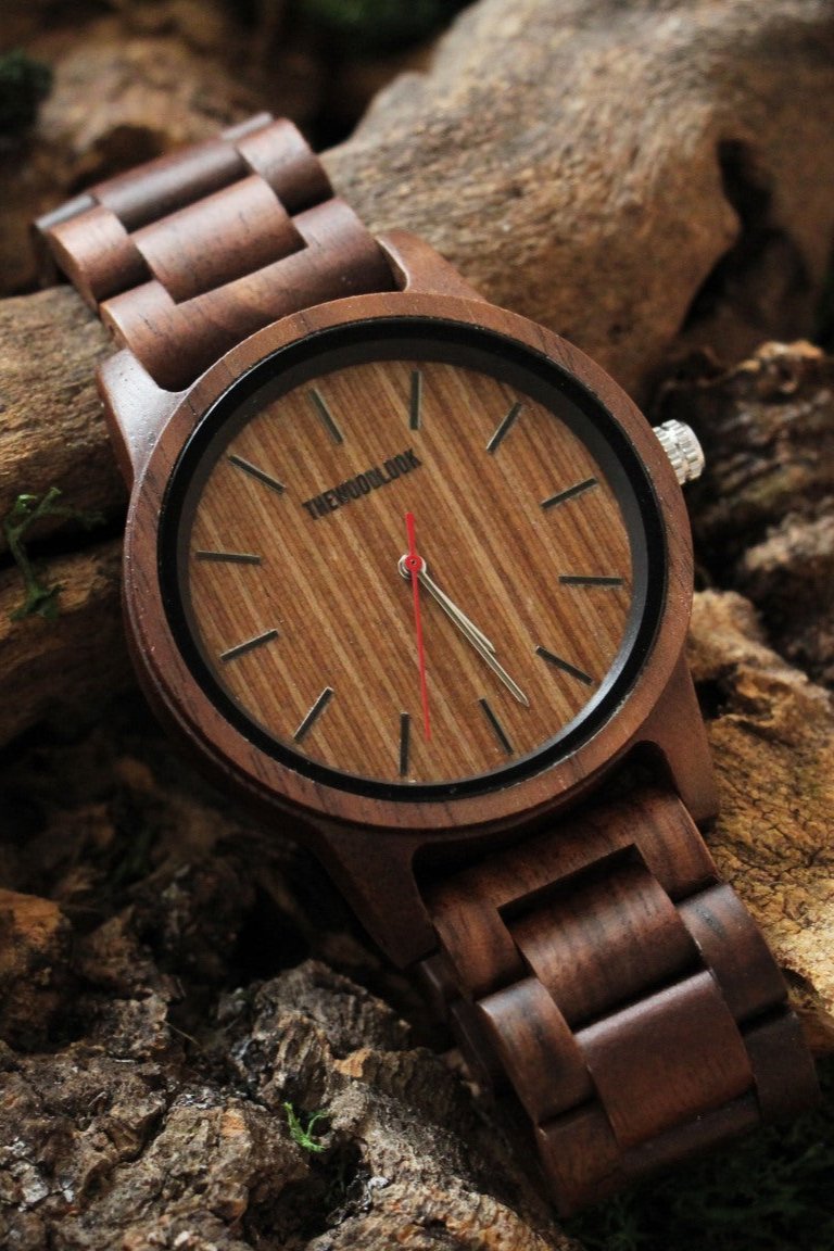 Warsaw all-walnut wooden watch with a wooden dial on bark - The Wood Look