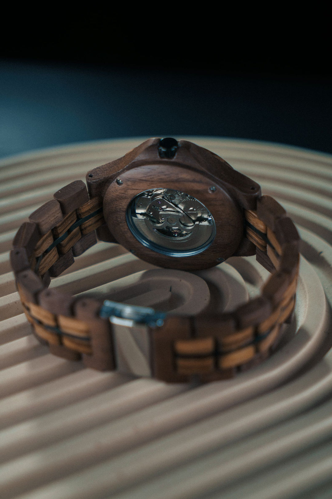 Barcelona walnut and zebrawood mechanical watch showing the see-through caseback and automatic movement - The Wood Look